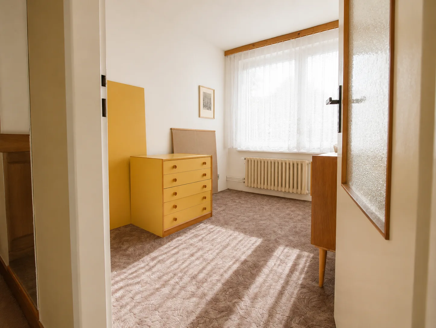 Basement room with garden-facing window