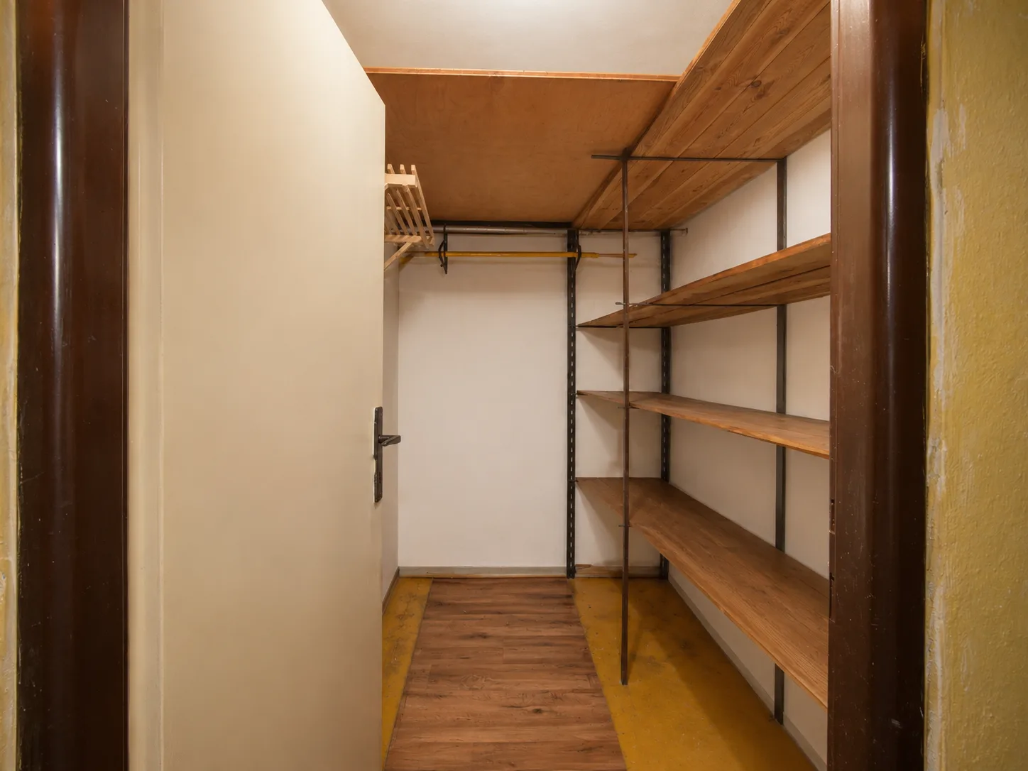 Basement pantry with built-in shelving