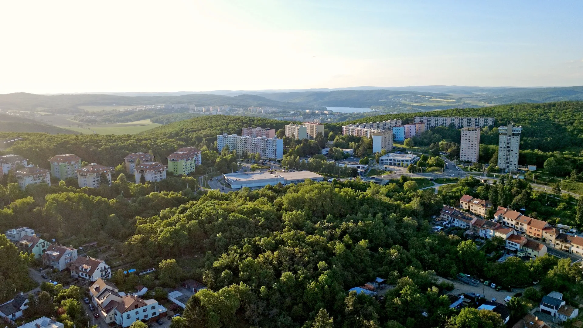 Aerial view towards the aquapark and surrounding forest
